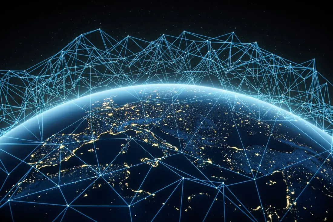 Tecnología BIM e inteligencia artificial en construcción — TPD Lab Globo terráqueo con red de datos luminosa